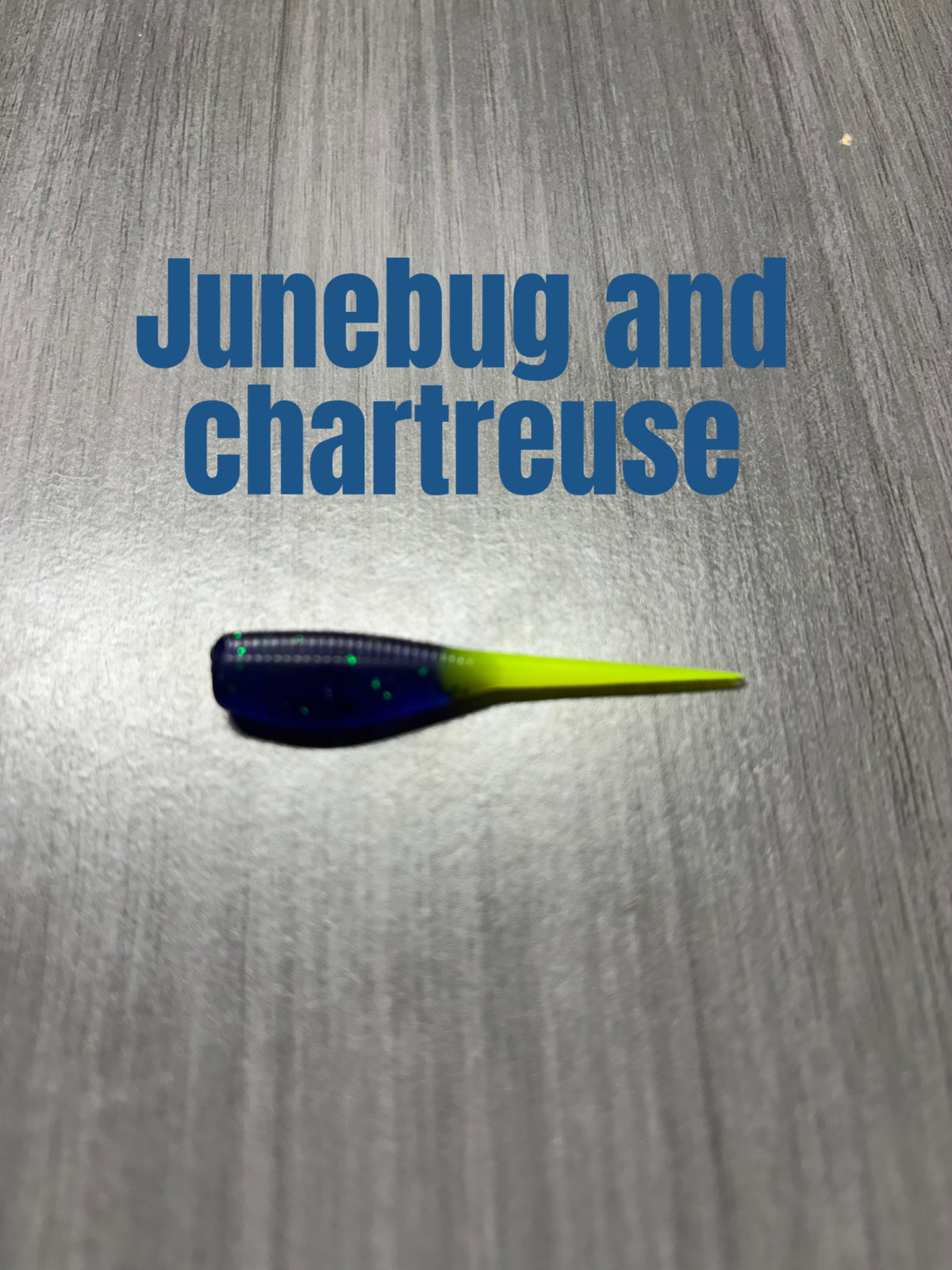 Livin' the Dream Crappie Baits Shad Body in Junebug and Chartreuse with a deep purple-blue body and chartreuse tail.