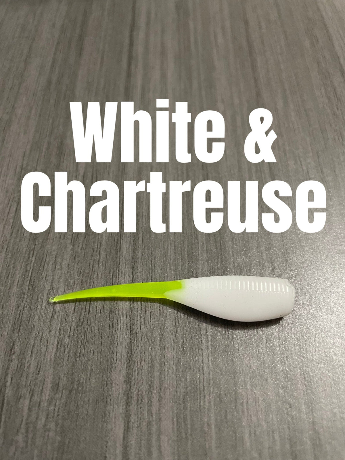 Shad Body crappie bait in White and Chartreuse, featuring an opaque white ribbed body and a slim pointed chartreuse tail.