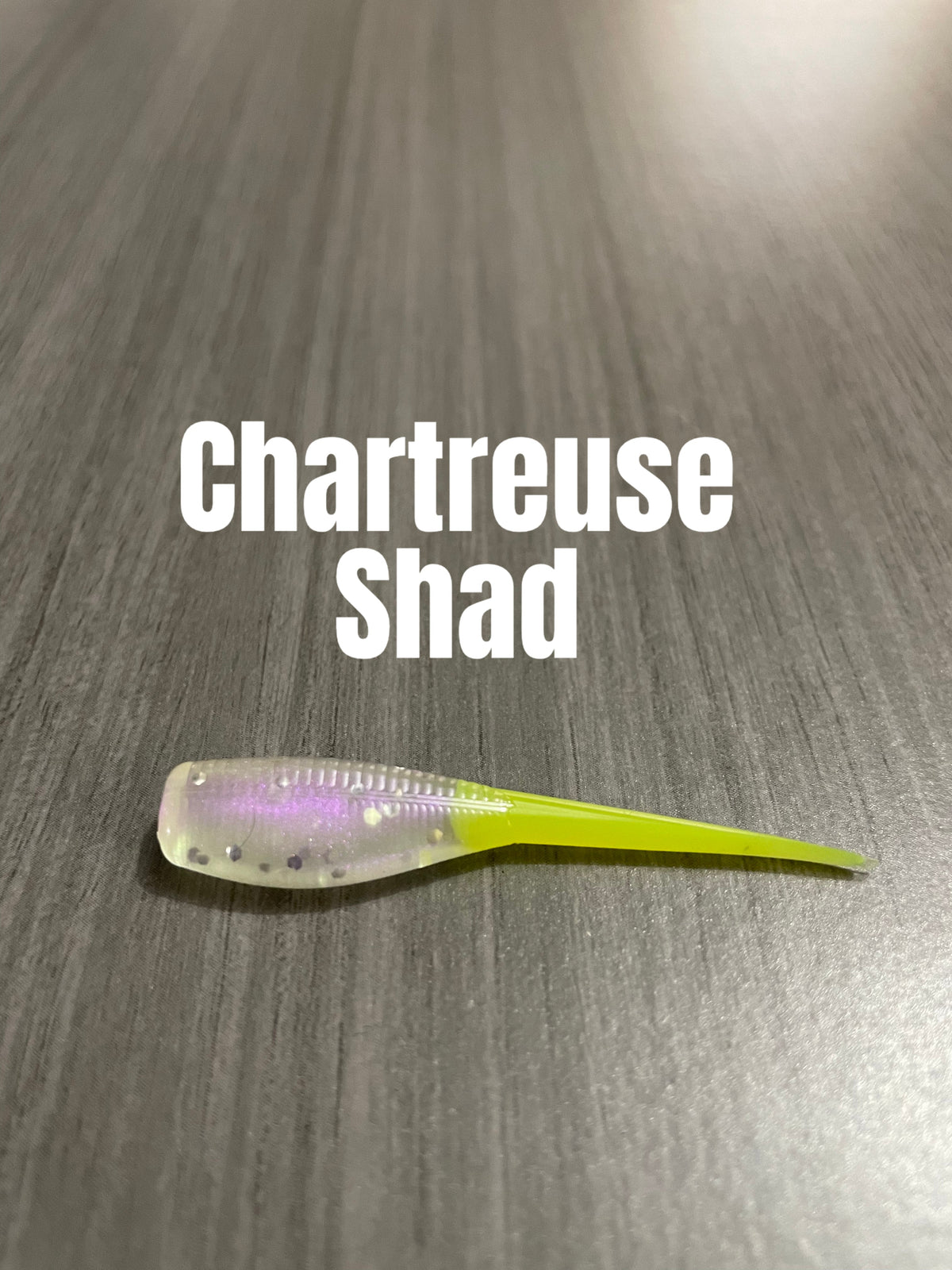 Livin' the Dream Crappie Baits Shad Body in Chartreuse Shad featuring a pearl-translucent body and chartreuse tail.