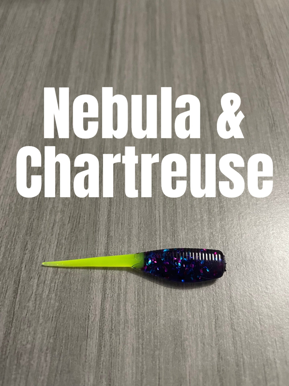 Nebula & Chartreuse Shad Body crappie bait featuring a dark blue-purple glittered body and chartreuse tail.