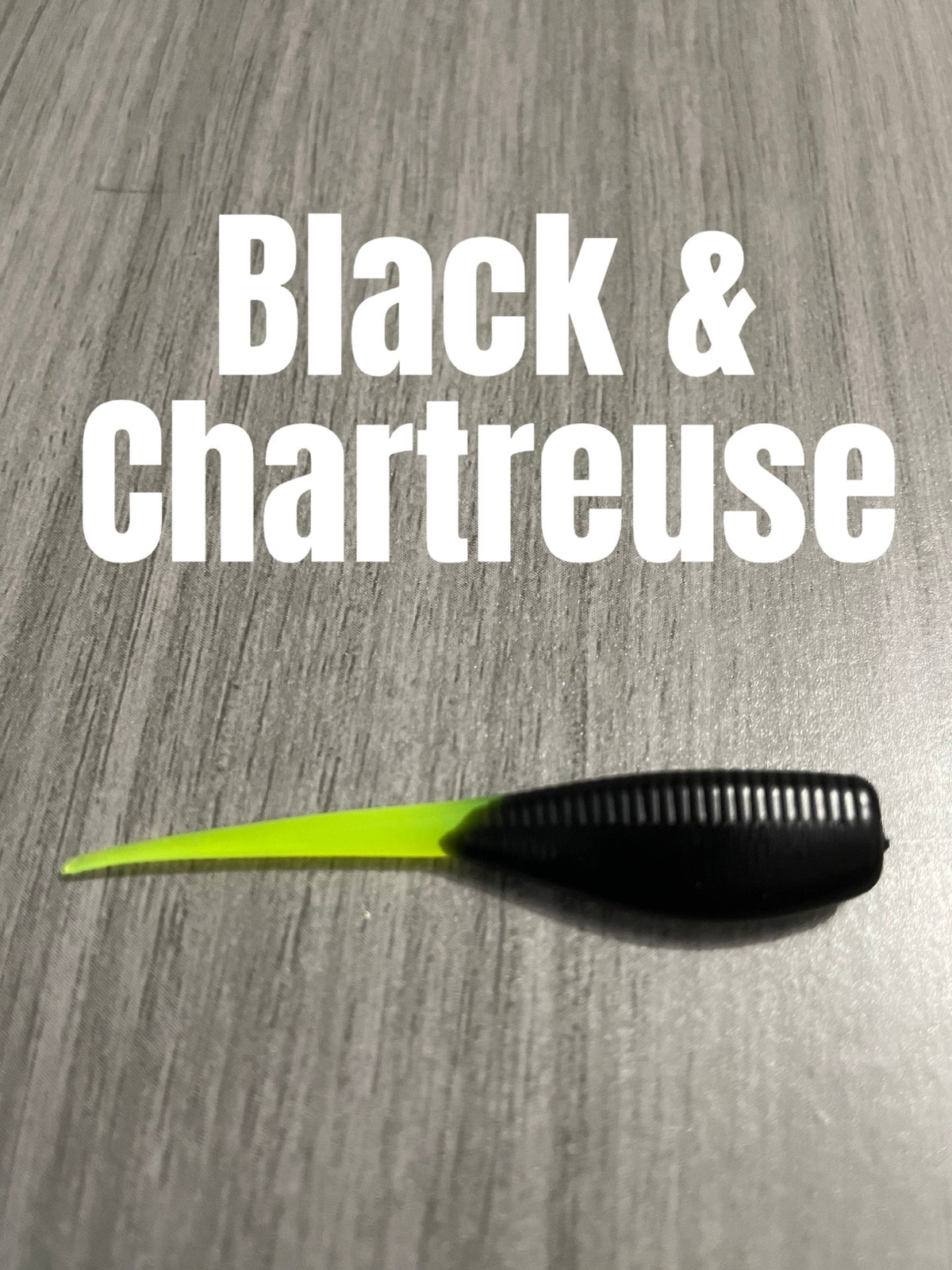 Livin' the Dream Crappie Baits Shad Body in Black & Chartreuse, featuring a solid black ribbed body and chartreuse tail.