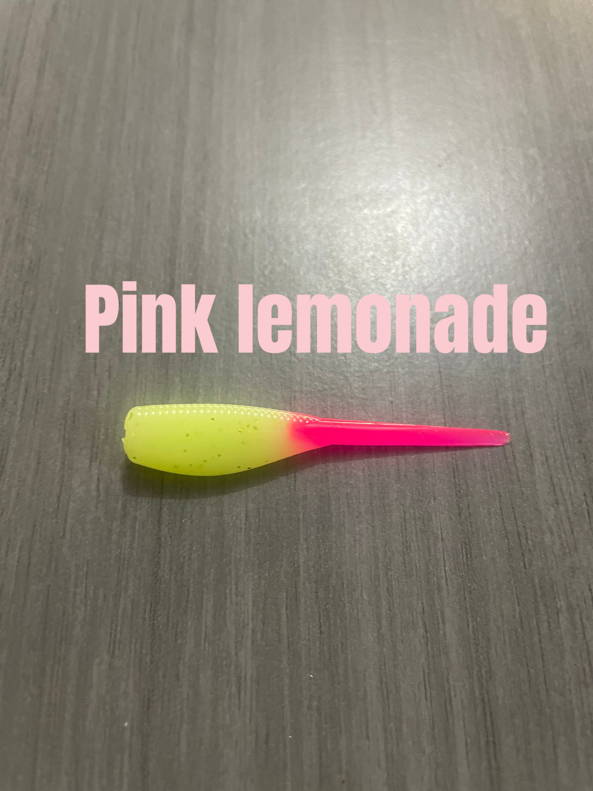 Pink Lemonade Shad Body crappie bait with chartreuse body, fine flakes, and bright pink tail.