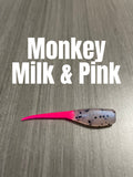 Shad Body crappie bait in Monkey Milk & Pink with a pearly translucent speckled body and bright pink tail.